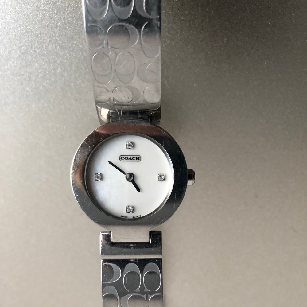 Coach silver watch.